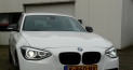 BMW X5 3.0i TZ-500-J en BMW M135i K-960-NV 032